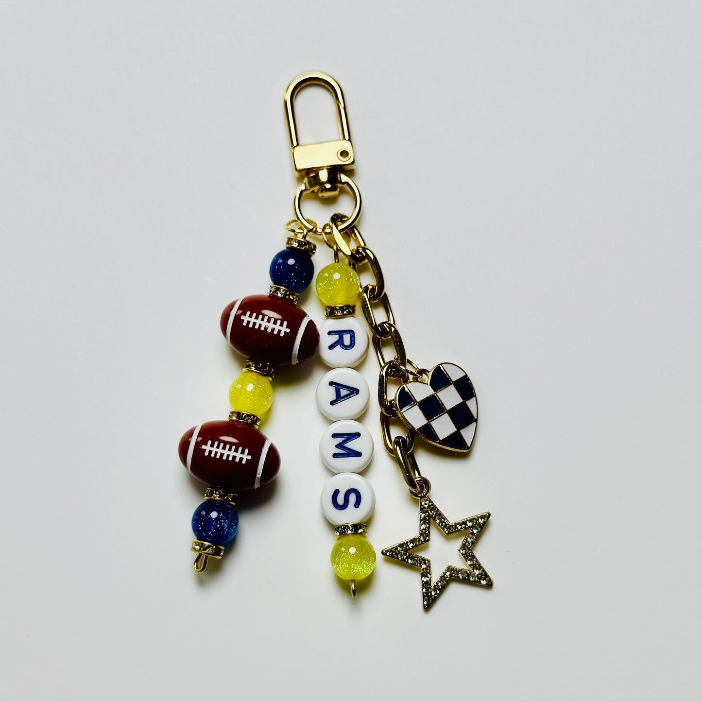Rams Football Beaded Keychain – Gold Bag Charm with Letter Beads, Football Beads, & Enamel Heart