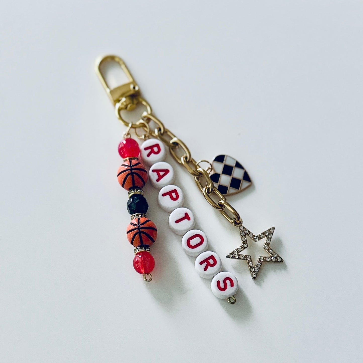 Raptors Basketball Keychain – Red & Black Beaded Keychain with Heart and Star Charms