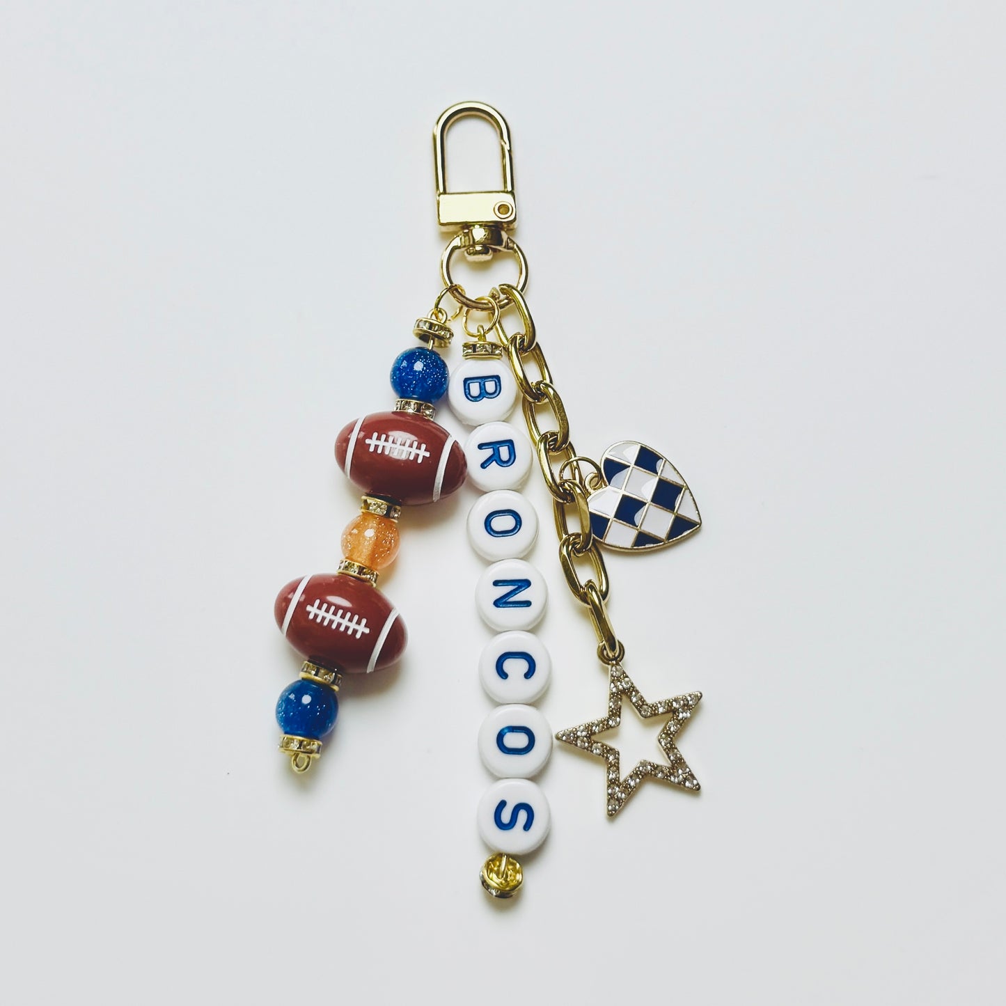 Broncos Football Beaded Keychain – Gold Bag Charm with Letter Beads, Football Beads, & Enamel Heart