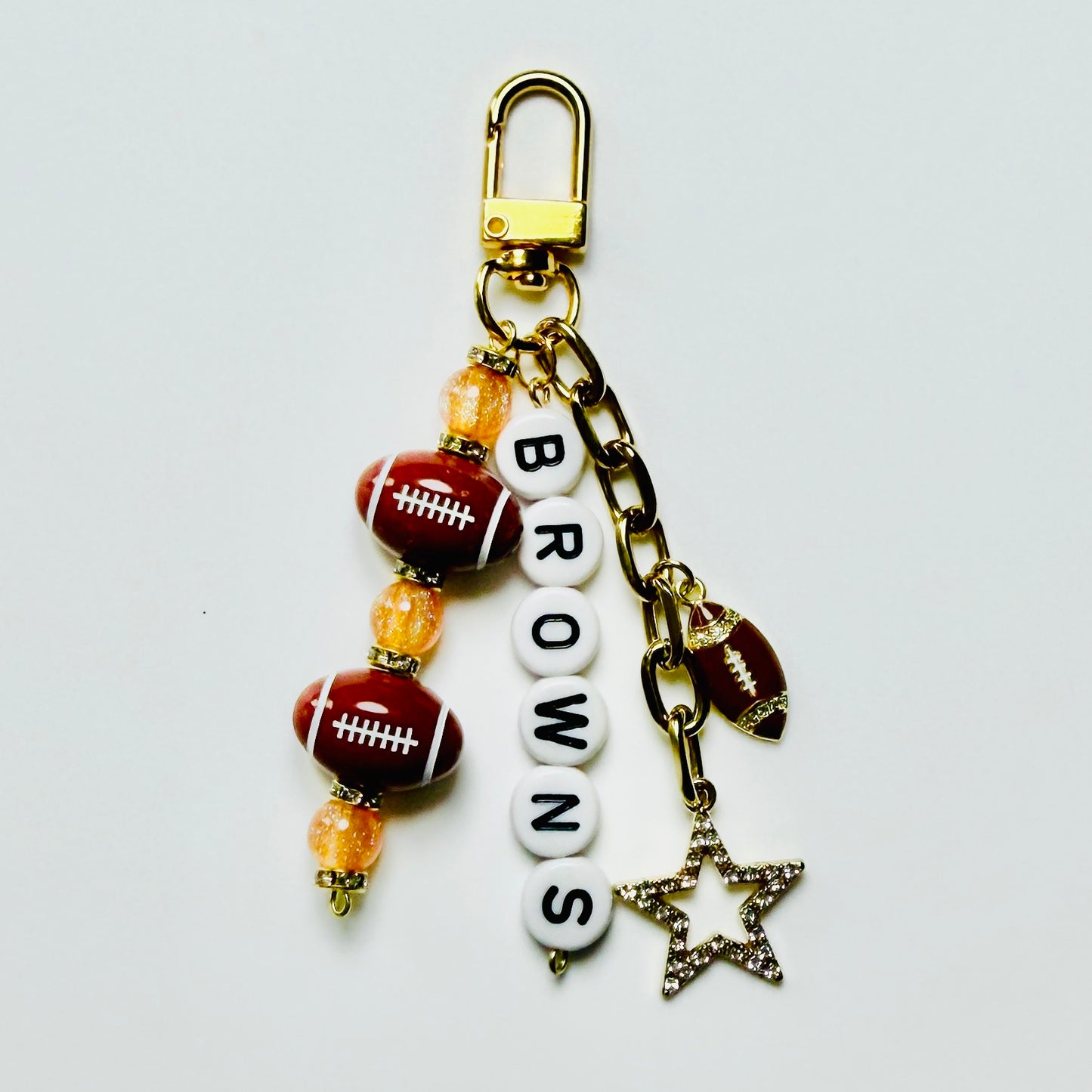 Browns Football Beaded Keychain – Gold Bag Charm with Letter Beads, Football Beads, & Enamel Football Charm