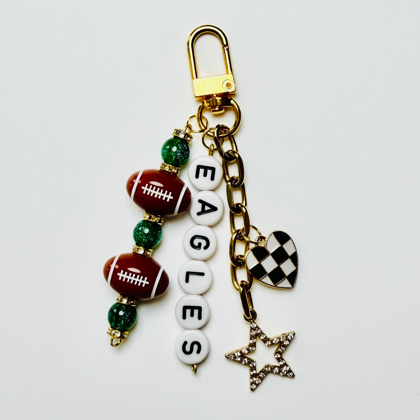 Eagles Football Beaded Keychain – Gold Bag Charm with Letter Beads, Football Beads, & Enamel Heart