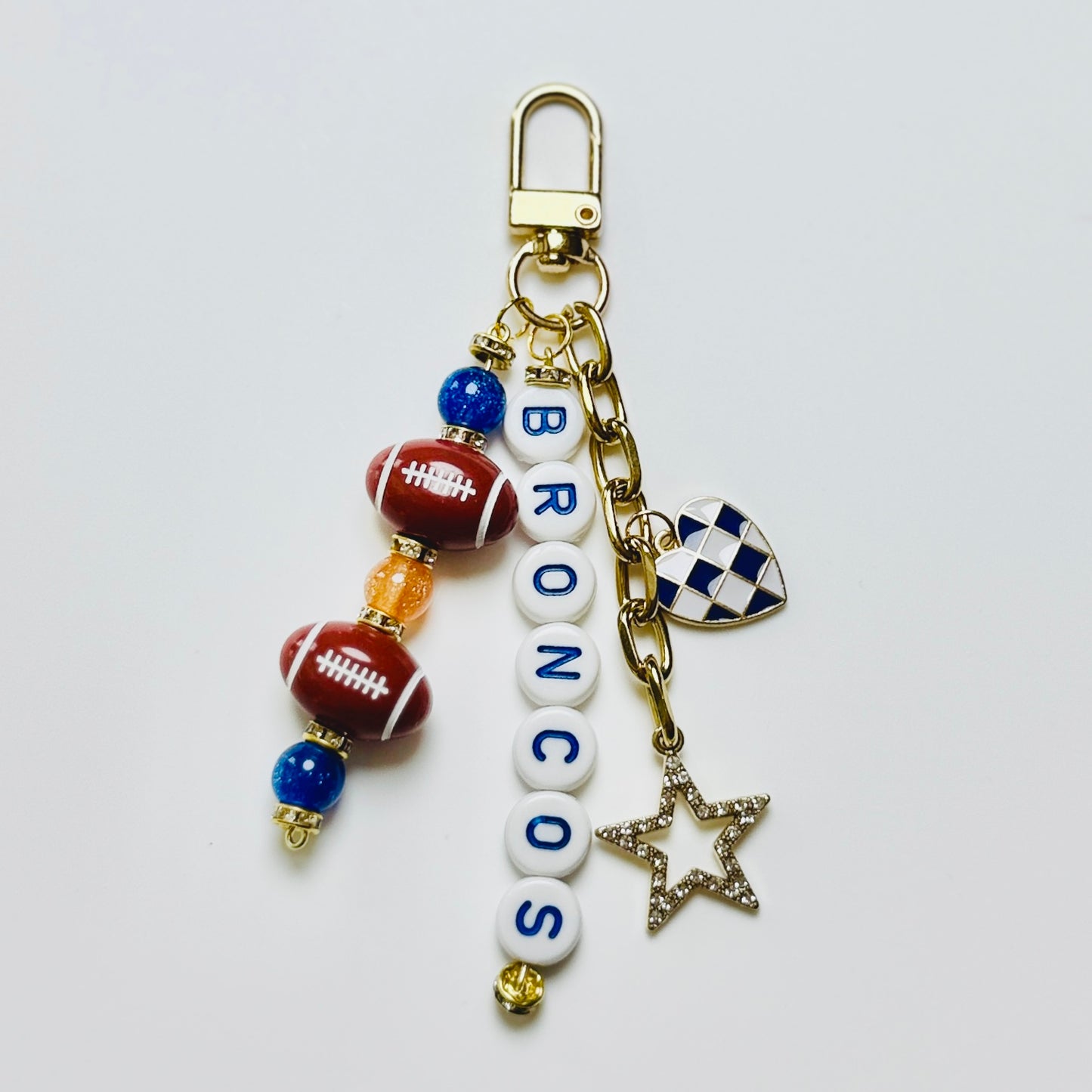 Broncos Football Beaded Keychain – Gold Bag Charm with Letter Beads, Football Beads, & Enamel Heart