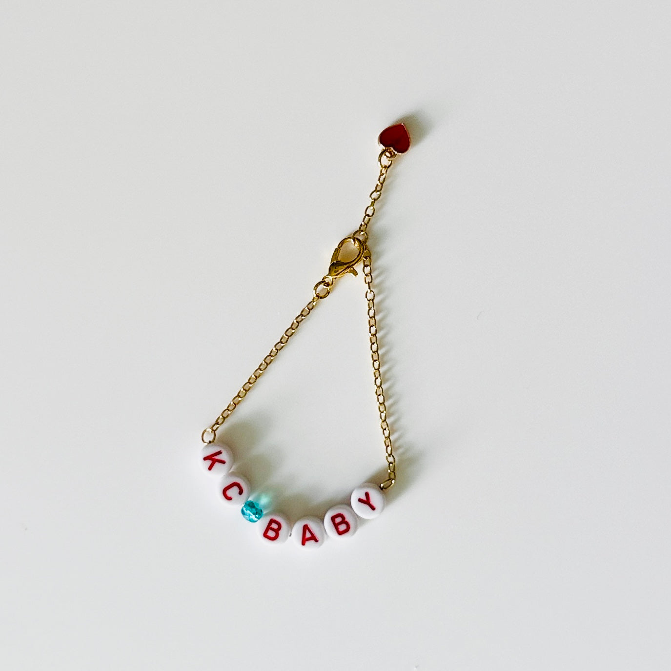 KC Baby Gold Chain Bracelet – Kansas City Soccer-Inspired Jewelry with Letter Beads & Teal Accent
