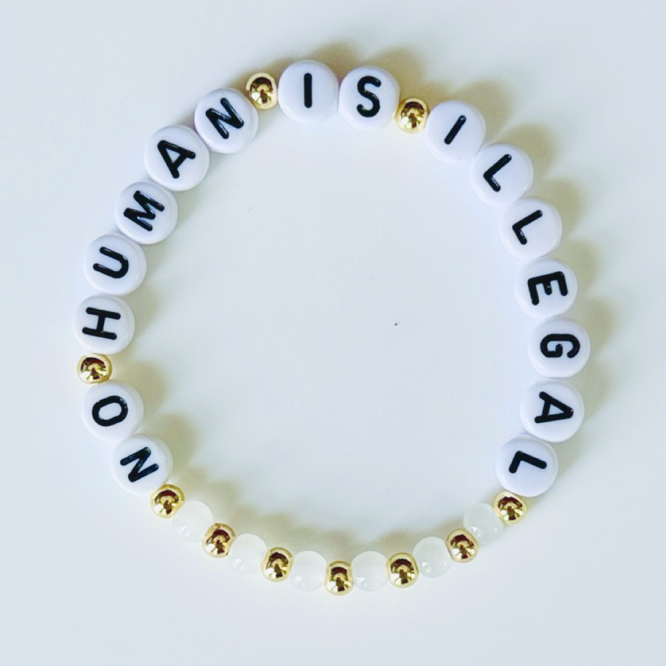 No Human Is Illegal Bracelet – Beaded Statement Bracelet with Proceeds Donated, Handmade Activist Jewelry Gift