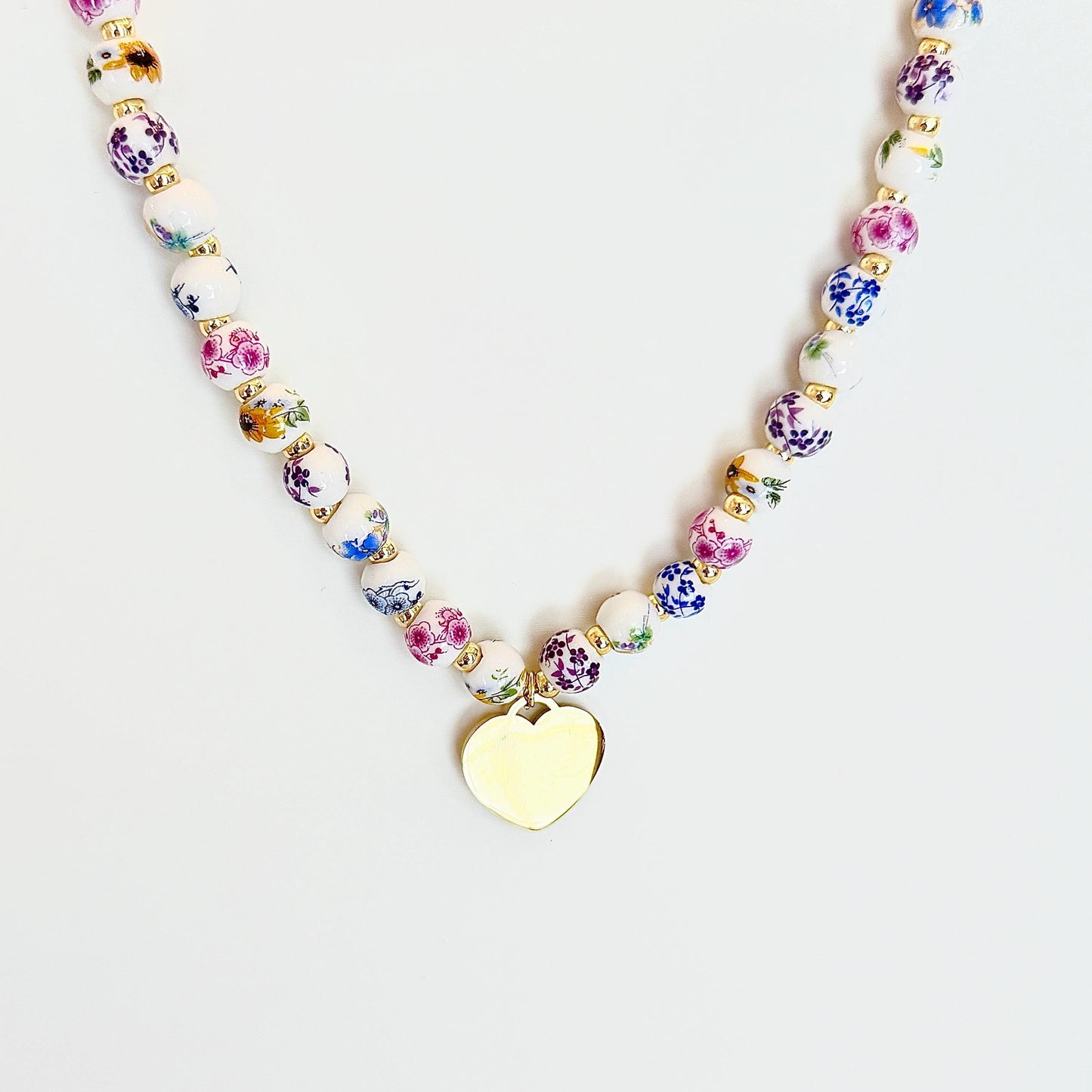 Porcelain Floral Bead Choker with Gold-Plated Heart Charm