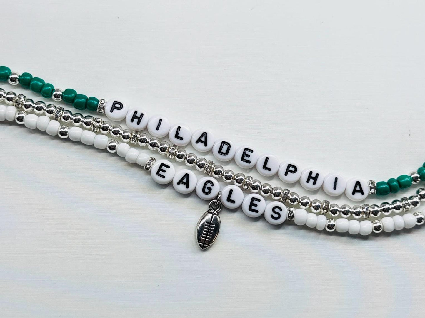 Eagles Football Bracelet Stack – Silver and White Beaded Game Day Jewelry with Football Charm, Handmade Fan Gift, Go Birds