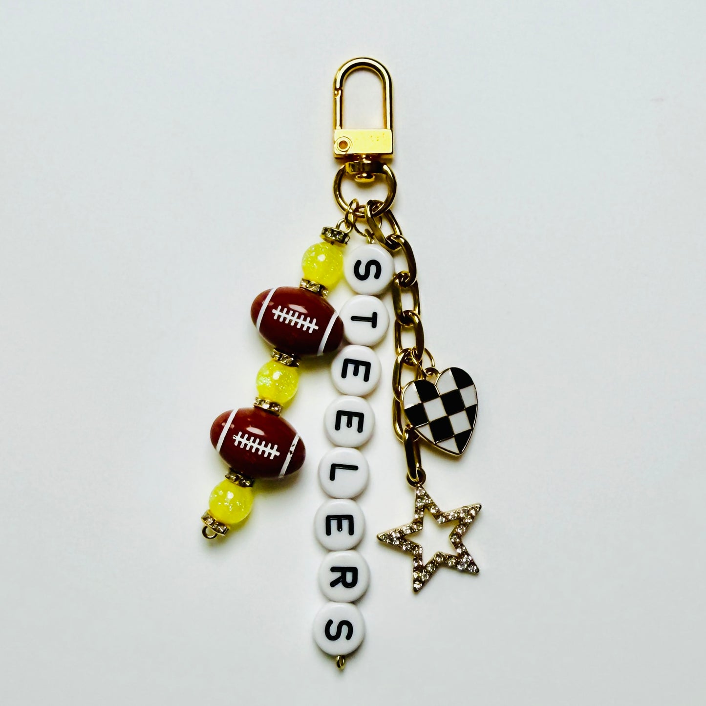 Steelers Football Beaded Keychain – Gold Bag Charm with Letter Beads, Football Beads, & Enamel Heart