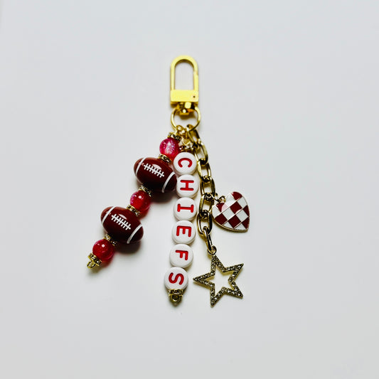 Chiefs Football Beaded Keychain – Gold Bag Charm with Letter Beads, Football Beads, & Enamel Heart