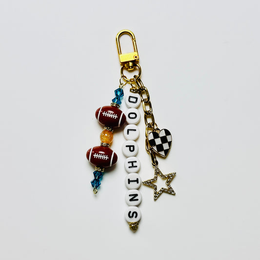Dolphins Football Beaded Keychain – Gold Bag Charm with Letter Beads, Football Beads, & Enamel Heart
