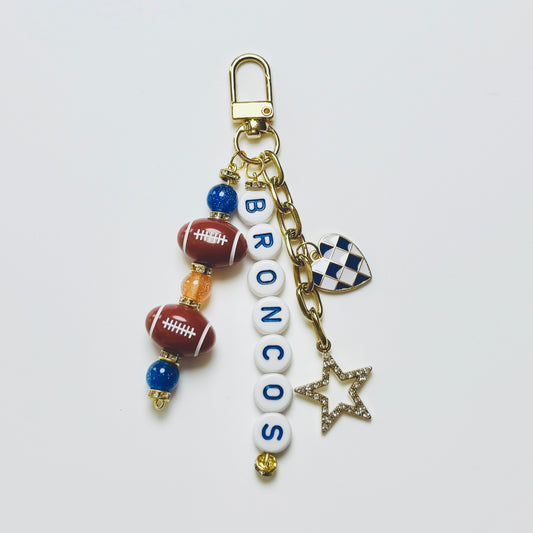 Broncos Football Beaded Keychain – Gold Bag Charm with Letter Beads, Football Beads, & Enamel Heart