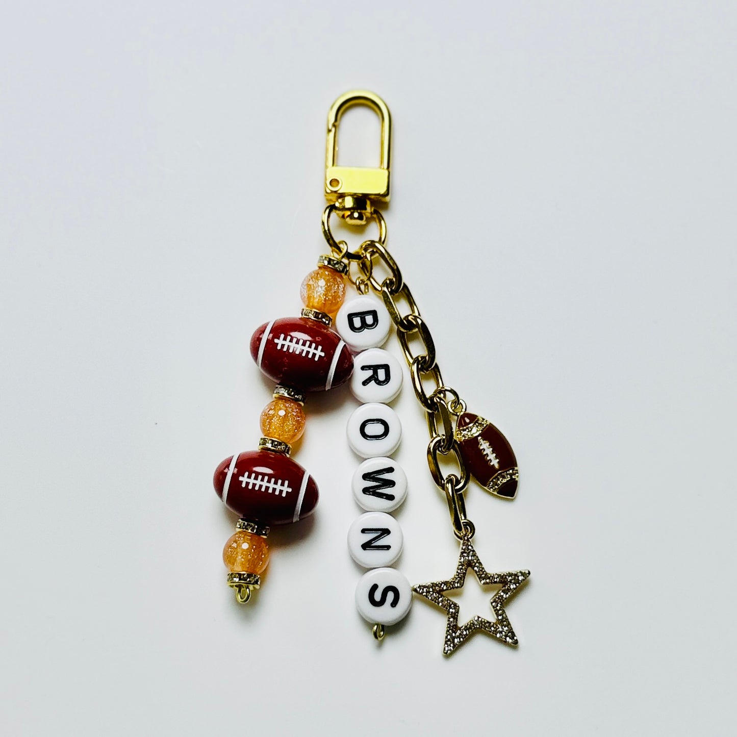 Browns Football Beaded Keychain – Gold Bag Charm with Letter Beads, Football Beads, & Enamel Football Charm