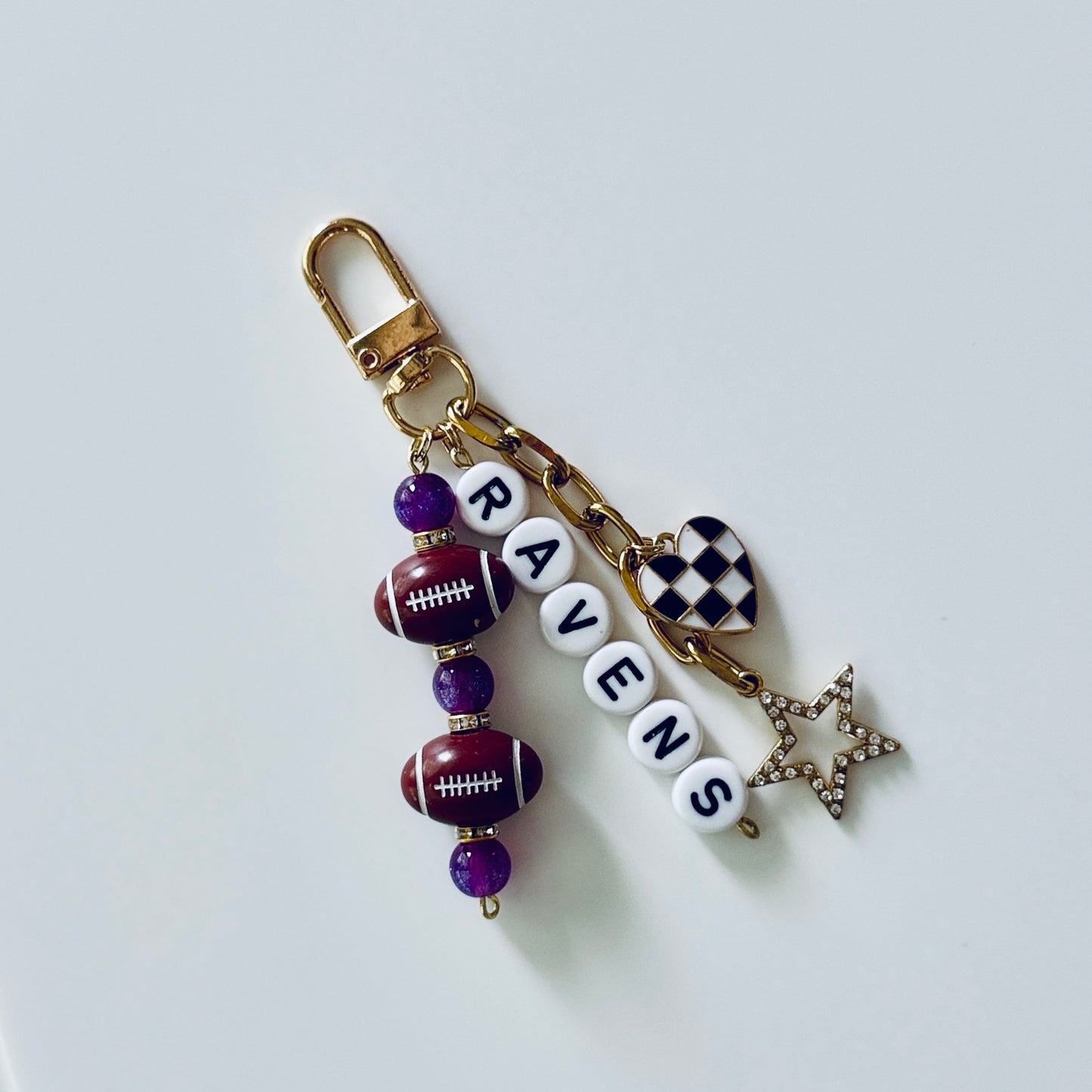 Ravens Football Beaded Keychain: Gold Bag Charm with Enamel Heart and Star