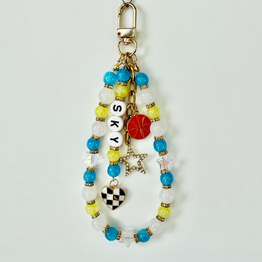 Sky Women’s Basketball, Blue, Yellow, White Basketball Bag Charm – 6.5” Handmade Beaded Keychain with Charms, Sports Bag Accessory, Resin Beads