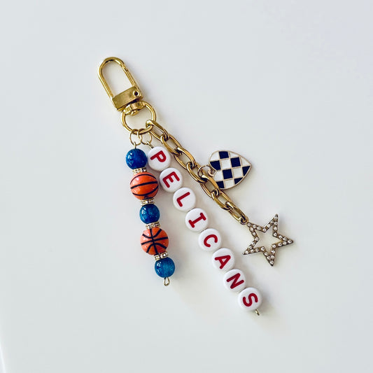 Pelicans Basketball Keychain – Gold, Blue & Red Beaded Keychain with Star and Heart Charms