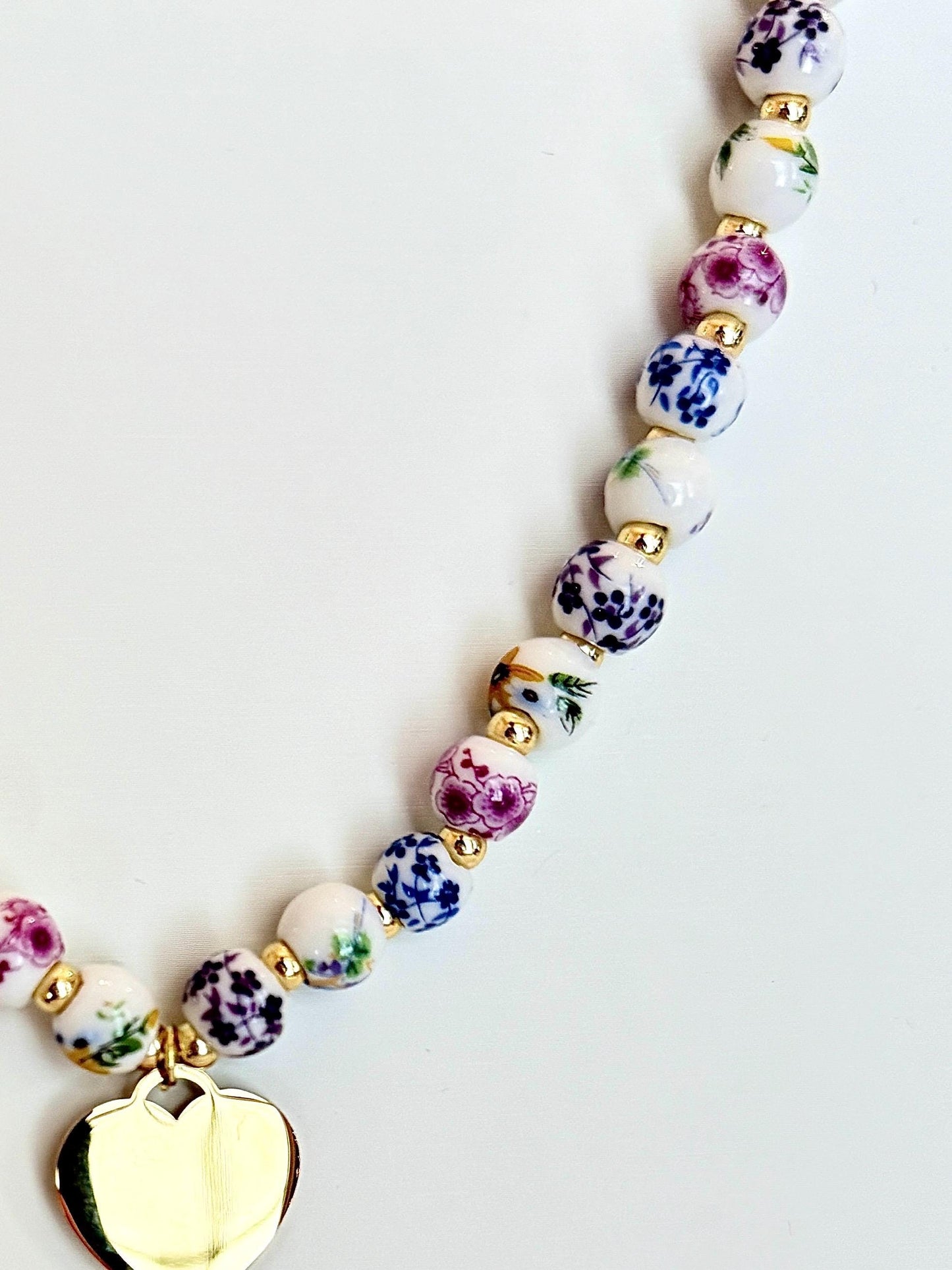 Porcelain Floral Bead Choker with Gold-Plated Heart Charm