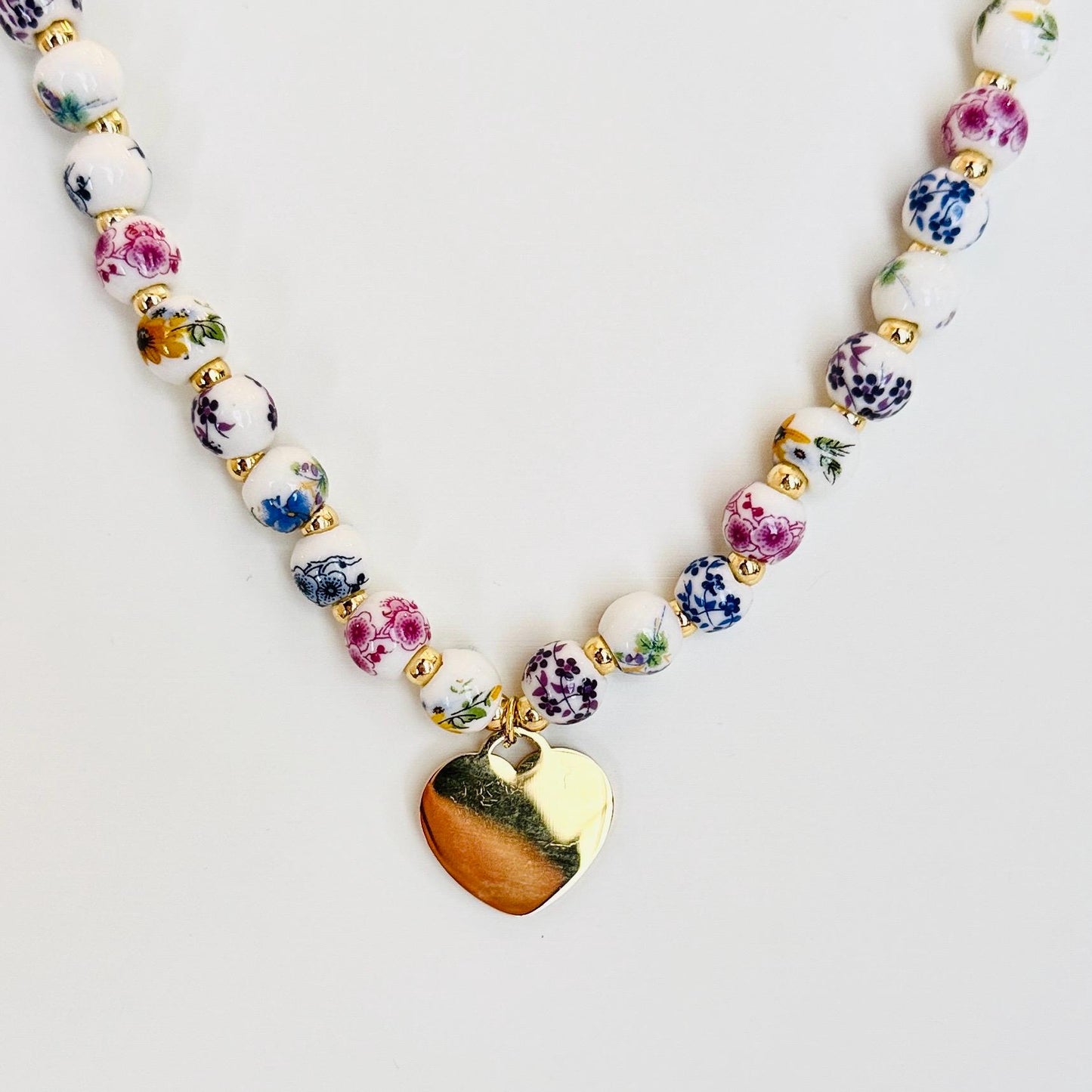Porcelain Floral Bead Choker with Gold-Plated Heart Charm