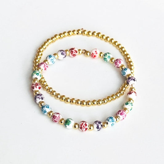 Floral Beaded Bracelet Stack – Pastel Beads with 14k Gold-Plated Accents and Personalized Initial Charm, Handmade Gift